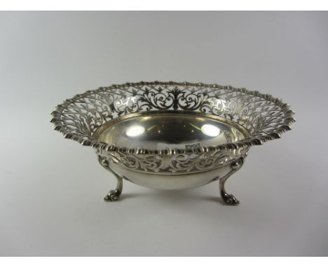 Silver dish raised on three scroll feet fretwork border by James Dixon & Sons Sheffield 1909 approx 6oz Condition Report Clic