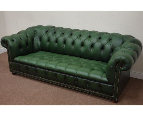 Three seat Chesterfield sofa upholstered in deeply buttoned green leather, W216cm Condition Report Click here for further ima