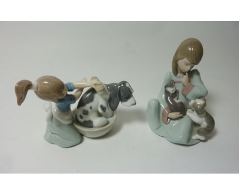 Two Lladro figurines - 'Bashful Bather' No. 5455 and 'Cat Nap' No. 5640 Condition Report Click here for further images, condi