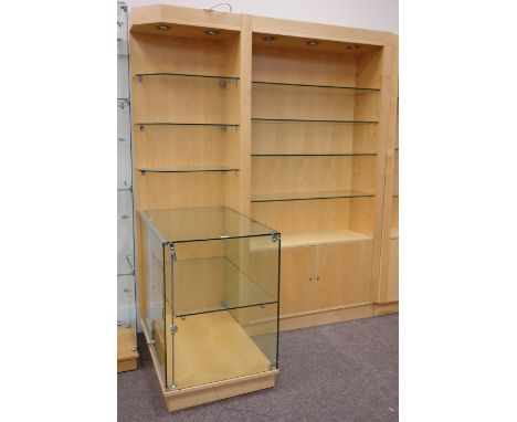 Maple wood illuminated display shelves, fitted with glazed display cabinet and double cupboard, W186cm, H223cm, D102cm Condit