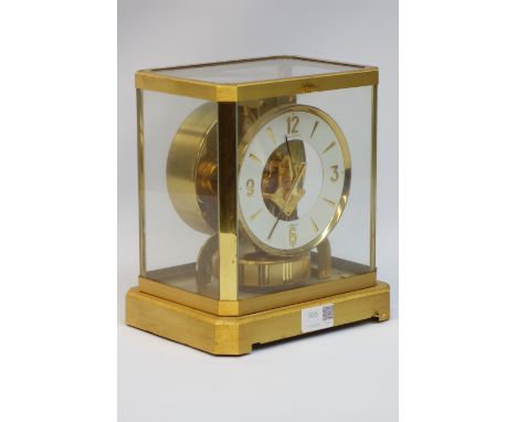 Jaeger-LeCoultre Atmos clock gilt and burnished case, white round dial with Roman numerals, No. 314775 with wall bracket, W 2