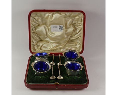 Set of four Edwardian silver salts by Richard Richardson Sheffield 1904 with blue glass liners and spoons cased Condition Rep