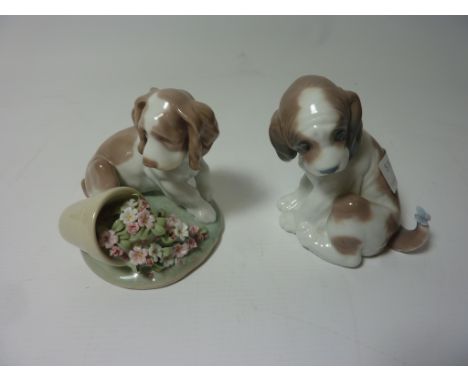 Two Lladro dog figures - 'Gentle Surprise' No. 6210 and 'It Wasn't Me' No. 7672  Condition Report Click here for further imag