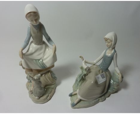 Two Lladro figurines - Lady with a dove and a Lady with a Rabbit, H 23.5cm  Condition Report Click here for further images, c