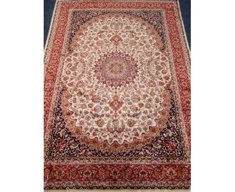 Persian Kashan design beige ground rug carpet, 230cm x 160cm Condition Report Click here for further images, condition, aucti