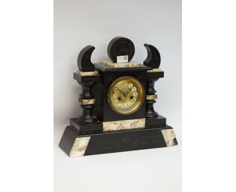 Victorian slate eight day clock, circular finial over gilt metal circular face , Arabic numerals, flanked by baluster columns