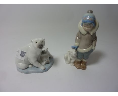 Two Lladro figurines - Eskimo Boy with Pet Polar Bear and a group of Polar bears  Condition Report Click here for further ima