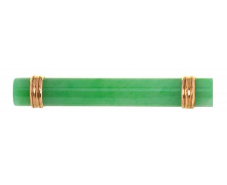 A JADEITE BATON BROOCH, C1930  in gold, 44mm, marked K 18 (twice), 7.3g++Not chipped and of good polish;good condition