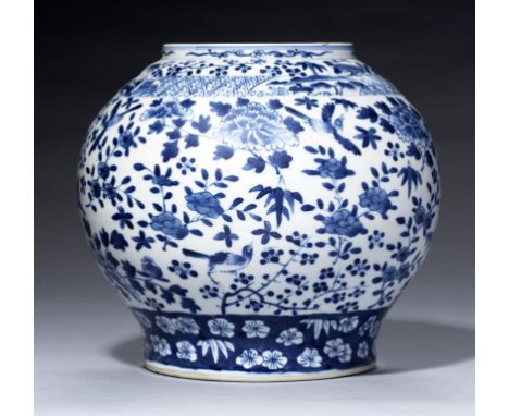 A CHINESE BLUE AND WHITE JAR, QING DYNASTY, 19TH C  painted with birds and flowers in diaper and 'cracked ice' borders, 19cm 