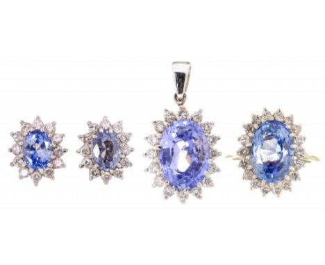 A  TANZANITE AND DIAMOND SUITE OF RING, PENDANT AND EARRINGS  in 18ct white gold, Birmingham date letter indistinct, earrings