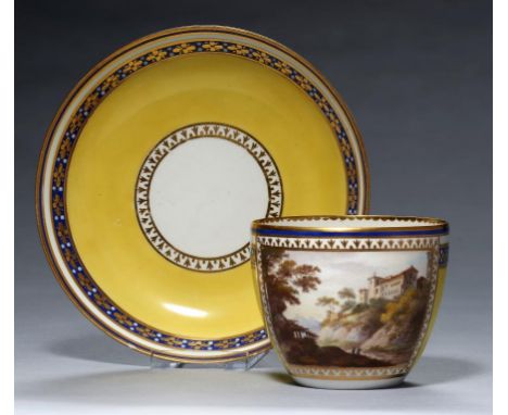 A DERBY   YELLOW GROUND TEA BOWL AND A SAUCER, C1795-7 the tea bowl painted with a rectangular landscape panel, saucer 14cm d