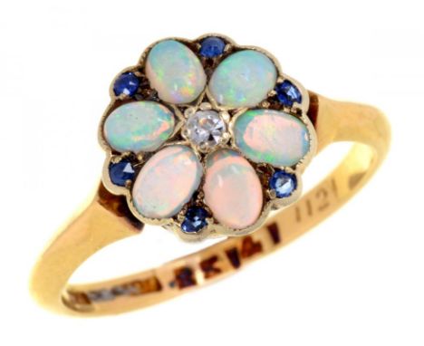 AN OPAL, DIAMOND AND SAPPHIRE CLUSTER RING, C1910  in gold marked 18ct, Su and inventory nos, 3.1g, size O++Under 10x magnifi