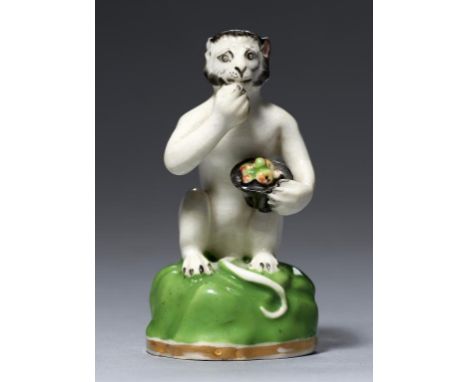 AN ENGLISH PORCELAIN MINIATURE MODEL OF A SEATED MONKEY, C1825-30 7cm h++Right ear chipped, no restoration detected