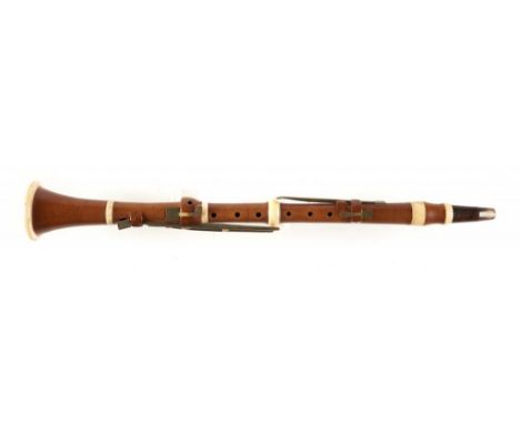 AN ENGLISH BOXWOOD CLARINET IN C, GOULDING &amp; CO LONDON, C1815 with turned ivory bands and six brass patent keys, all five