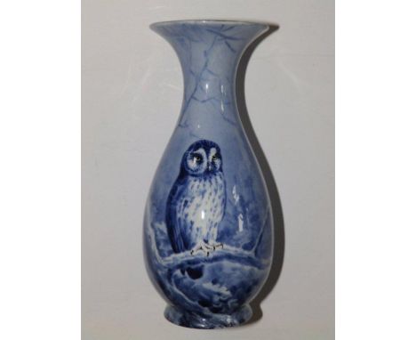 A porcelain vase painted in blue monochrome with an owl in a winter landscape – signed D. Birbeck,  7” high  (Birbeck worked 