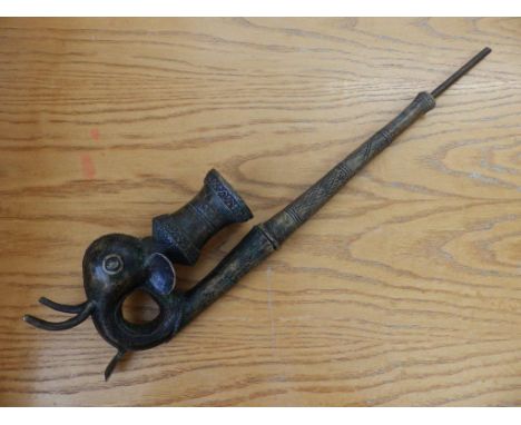 A West African ceremonial metal pipe, modelled as a desert Jerboa rat