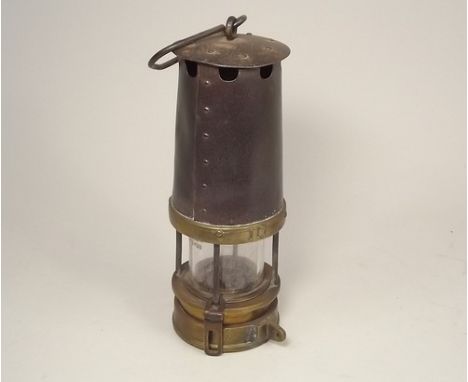 MINER'S LAMP.
A Patterson & Co. Cornish miner's safety lamp.
Height 21cm. CONDITION REPORTS: The approximate cost of post and