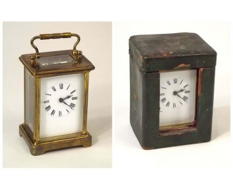 CARRIAGE CLOCK.
An early 20th century, brass cased carriage clock with case.
NOTE: In-house shipping not available for this l