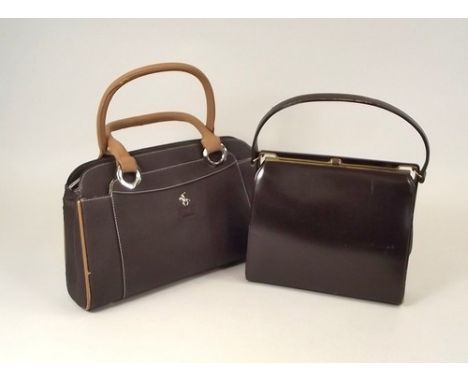 HANDBAGS.
A vintage brown leather, metal frame handbag, by Ackery & a modern Polo 'William' handbag.