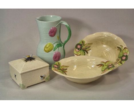 CLARICE CLIFF ETC.
A pair of Clarice Cliff, Newport Pottery moulded dishes, 26cm, a Crown Devon honey box & a Crown Devon tul