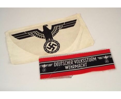 CHANNEL ISLANDS WWII OCCUPATION ITEMS.
A Nazi sports shirt badge & a German People's Army internment guard arm band.