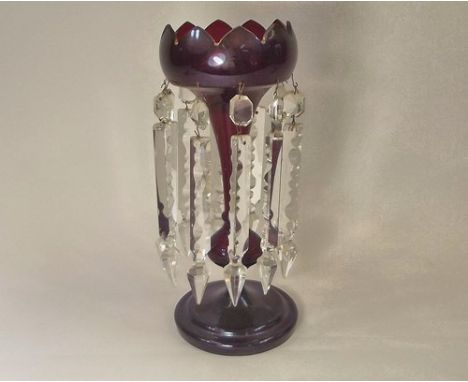 SINGLE LUSTRE.
A Victorian ruby-stained glass lustre.
Height 33cm.
NOTE: In-house shipping not available for this lot due to 