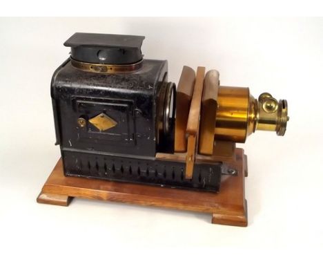 MAGIC LANTERN.
A tin plate & brass magic lantern, converted for electricity.
NOTE: In-house shipping not available for this l