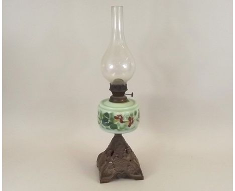 OIL LAMP.
A Victorian cast iron oil lamp with enamelled glass fount.
Full height 56cm.
NOTE: In-house shipping not available 