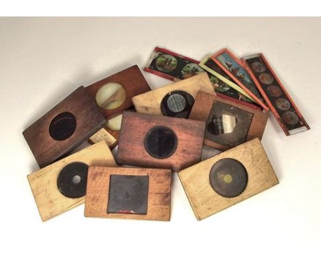 MAGIC LANTERN SLIDES.
Wooden mounted slides etc. including some hand-drawn astronomical. 