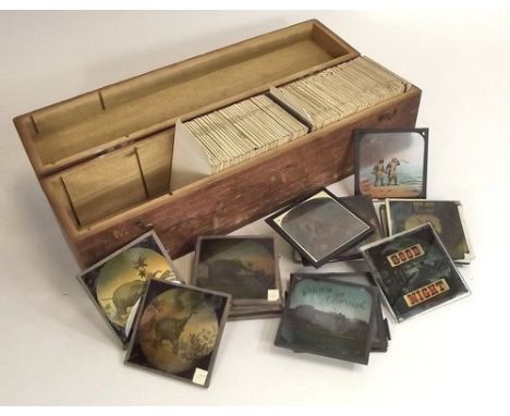 MAGIC LANTERN SLIDES.
A box of approx 100 plus glass magic lantern slides. Elephant's Revenge(10), Robinson Crusoe(14), & Lon