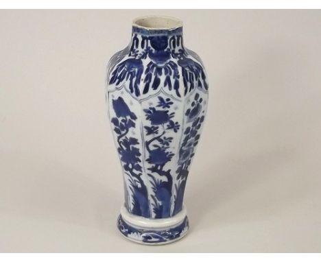 CHINESE VASE.
A Kangxi period vase. Painted flower device to base.
Height 24cm. CONDITION REPORTS: There is an extensive area