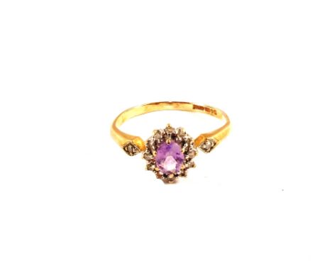A 9ct gold amethyst and diamond ring, size L