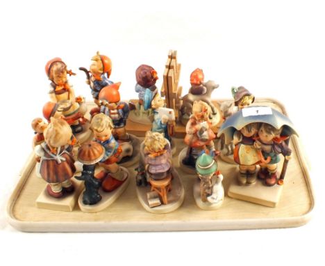 A tray of various Hummel figurines