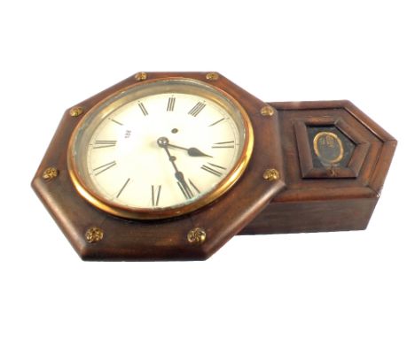 An octagonal drop dial wall clock