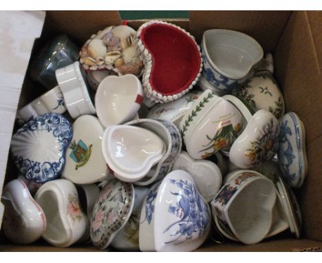 A large quantity of heart shaped trinket boxes plus a large quantity of mainly porcelain ring trees