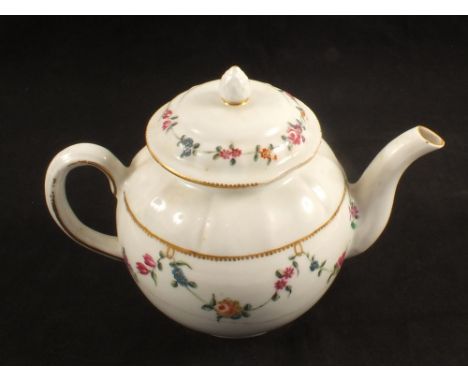 An 18th Century Derby porcelain teapot with floral decoration, gold anchor mark (cracked)