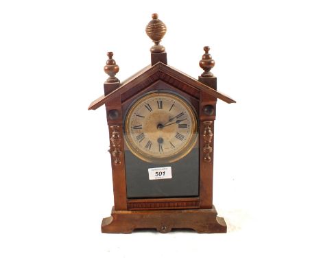 An American carved pine mantel clock