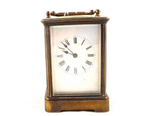 A brass cased carriage clock