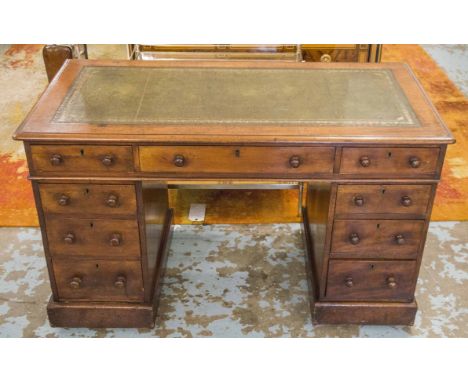 PEDESTAL DESK, Victorian mahogany with green leather top above nine drawers on castors, 72cm H x 120cm x 61cm.