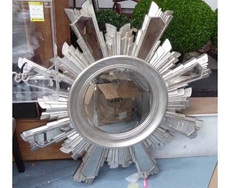 SUNBURST MIRROR, 1950s French style round bevelled plate in distressed silvered surround with sectional plater, 120cm diam. (