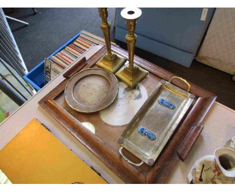 Two brass candlesticks, a Persian brass tray with enamel inserts, a brass type Church plate and an early Victorian wooden tra