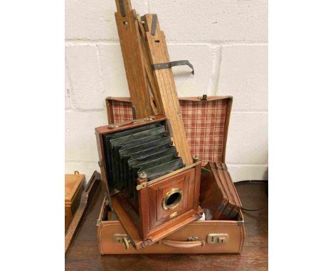 A late Victorian mahogany cased field camera with lens, tripod, plates and other cameras including 35mm point-and-shoot