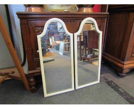 A pair of arch top painted mirrors, 80cm tall