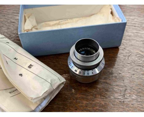 A Dallmeyer 1'' lens, f/1.9 serial number 353579, boxed