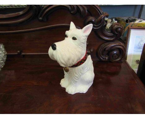 A ceramic biscuit barrel in the form of a Scottish Terrier dog