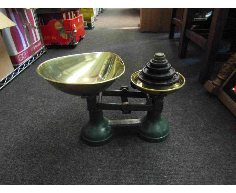 A set of kitchen scales and weights