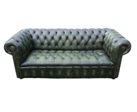 20thC Green Leather Chesterfield Sofa with button back and brass stud decoration and applied turned feet, marked Made in Engl