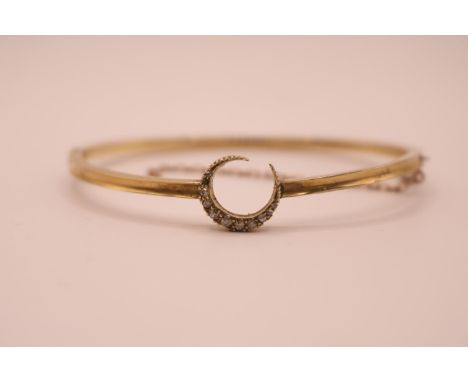 19thC Gold Bangle with Diamond Milgrain set Crescent applied. 57mm in Diameter. 6.6g total weight 