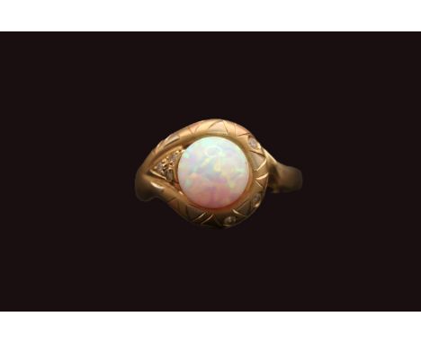 Elmali 14K Gold Snake design ring set with Spherical Opal 8mm. Size O. 4.7g total weight 