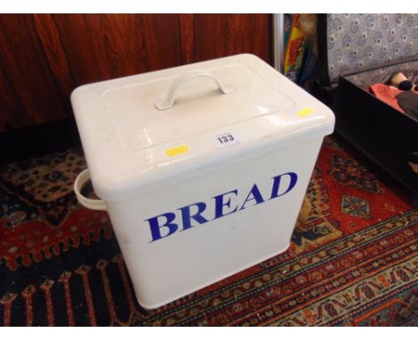 An enamel bread bin